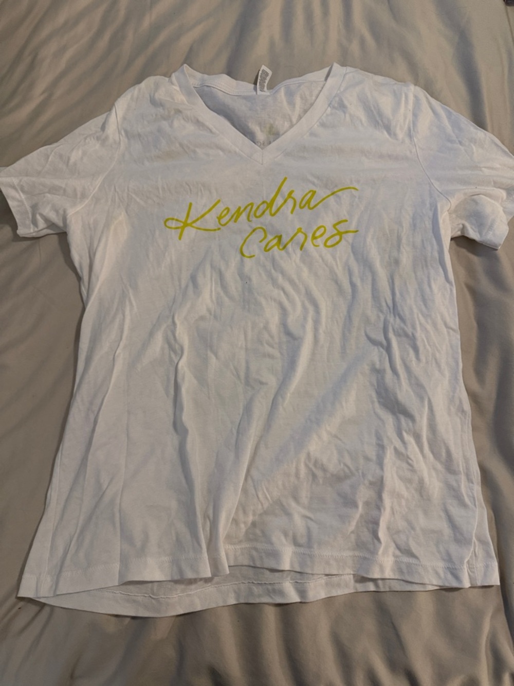 Kendra Scott White V-Neck Tee with Yellow Script